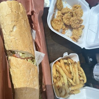 Cajun Kitchen Seafood & Poboys - Roast beef poboy, fries and fried pickles - Cajun/Creole Near Me - Boutte, Louisiana Cajun Kitchen Seafood & Poboys - Roast beef poboy, fries and fried pickles - Cajun/Creole Near Me - Boutte, Louisiana