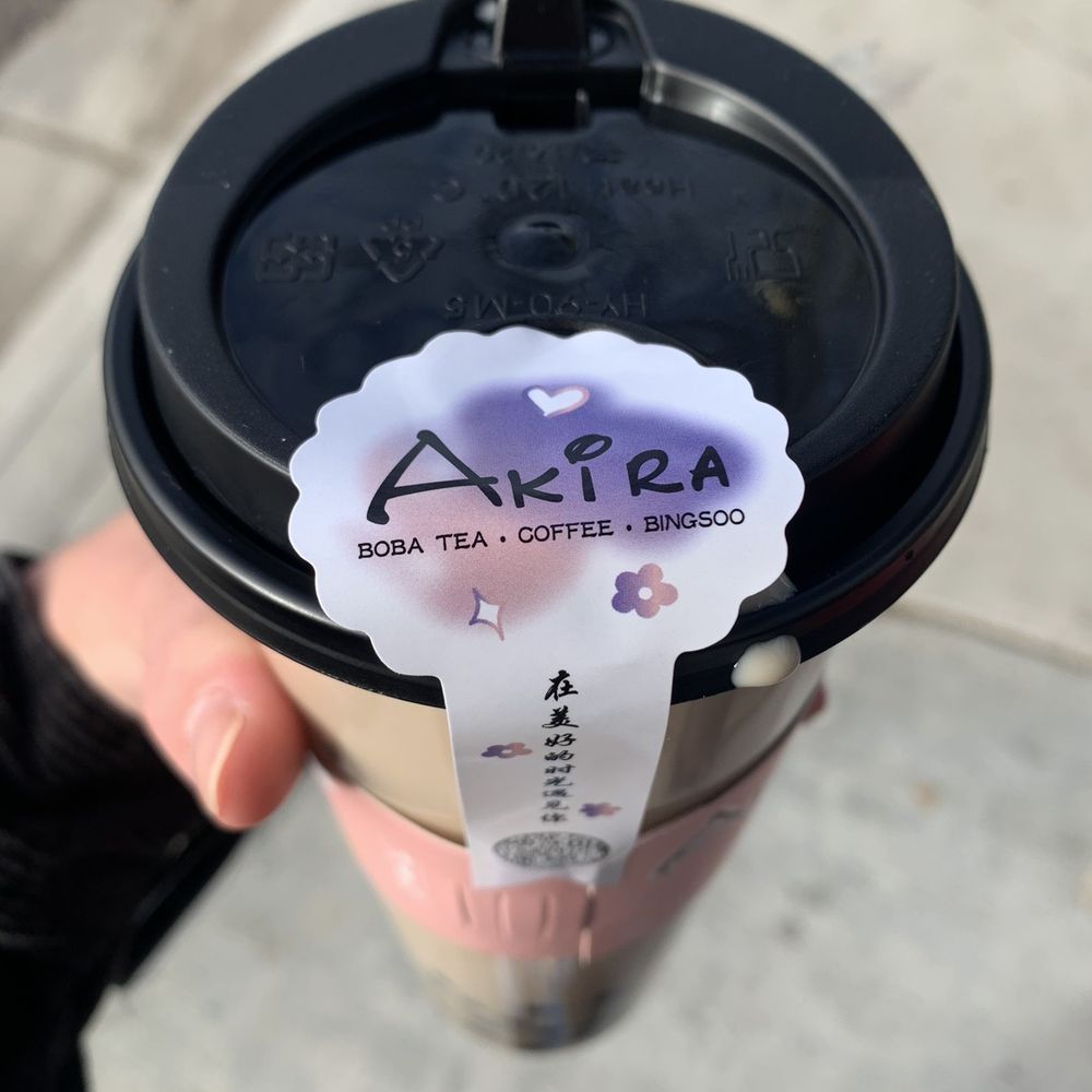 Fourteasons Coffee & Tea - a hand holding a coffee cup - Bubble Tea Near Me - Davis, California Fourteasons Coffee & Tea - a hand holding a coffee cup - Bubble Tea Near Me - Davis, California