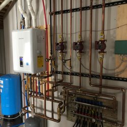 Classic Plumbing & Heating - A Navien boiler system Classic installed.