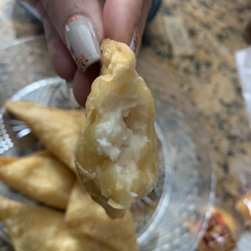 Hot Wok - Stuffing shot of Crabmeat cream cheese wonton - Chinese Near Me - Metairie, Louisiana