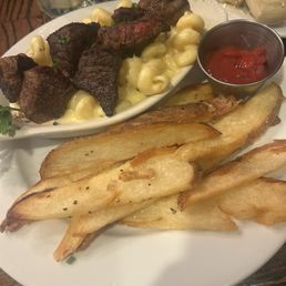 Girl dinner was a special in August Fries- Mac n cheese -ceaser salad not pictured I added steak bites to mine! SO GOOD Girl dinner was a special in August Fries- Mac n cheese -ceaser salad not pictured I added steak bites to mine! SO GOOD