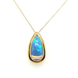 P.J. Rossi Jewelers - 18K Yellow Gold Ethiopian Opal Pear Shape Pendant Elegant 18K yellow gold pendant featuring a pear-shaped Ethiopian opal (4.8...