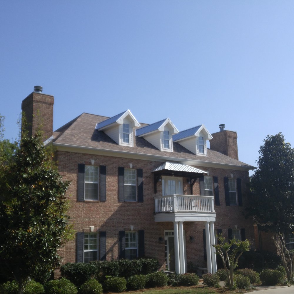 Slide of Tadlock Roofing