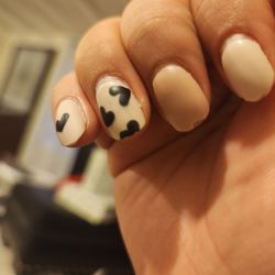 V Nails & Spa - Chipped paint and smeared design.