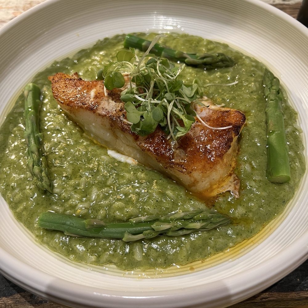 Luca Turci - SEA BASS WITH ASPARAGUS RISOTTO Grilled Chilean sea bass served with asparagus risotto - Italian Near Me - Winter Park, Florida Luca Turci - SEA BASS WITH ASPARAGUS RISOTTO Grilled Chilean sea bass served with asparagus risotto - Italian Near Me - Winter Park, Florida