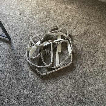 Mike the Carpet Guy - The excess carpet after the power stretch was completed. Room #1 - Carpet Installation Near Me - Meridian, Idaho