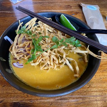 Basil Canteen - Kao soi (egg noodles in a curry with beef). There are dry noodles on the top and soupy noodles immersed in the curry soup. - Thai Near Me - San Francisco, California