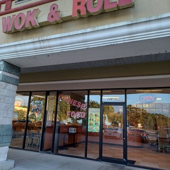 Wok & Roll - the front of a restaurant - Chinese Near Me - Orlando, Florida Wok & Roll - the front of a restaurant - Chinese Near Me - Orlando, Florida