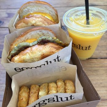 Eggslut - Wagyu Cheeseburger, Sausage Egg and Cheese, Truffle Hashbrowns, Orange Juice - Burgers Near Me - Portland, Oregon Eggslut - Wagyu Cheeseburger, Sausage Egg and Cheese, Truffle Hashbrowns, Orange Juice - Burgers Near Me - Portland, Oregon