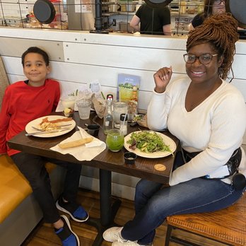 First Watch - Simple Lemon Dressed Organic Mixed Greens,  Buttered Bobs Red Mill Grits with Shrimp,  waffle and bacon, Kale Tonic, Morning Meditation - Breakfast & Brunch Near Me - Summerville, South Carolina