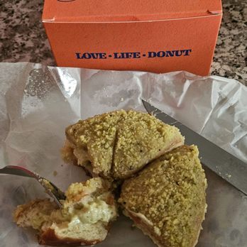 Old Ferry Donut - Had already cut the butter pistachio donut into quarters and dug in before realizing I didn't take a before photo. Whoops. - Donuts Near Me - Buena Park, California Old Ferry Donut - Had already cut the butter pistachio donut into quarters and dug in before realizing I didn't take a before photo. Whoops. - Donuts Near Me - Buena Park, California
