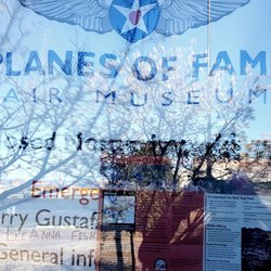 Planes of Fame Air Museum - Can only C "Closed No..." Can't C rest--photo posted over it. Lg sign on street (don't C driving SB) OPEN DAILY, sm print below "April-Oct."