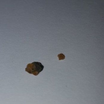 Newk's Eatery - Pebble with part that broke off when I nearly broke my tooth. - Pizza Near Me - Tyler, Texas