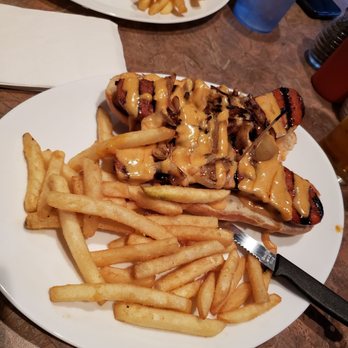 Nicky's Lionshead Taverns - Andouille sausage sandwich and fries. - New American Near Me - De Pere, Wisconsin