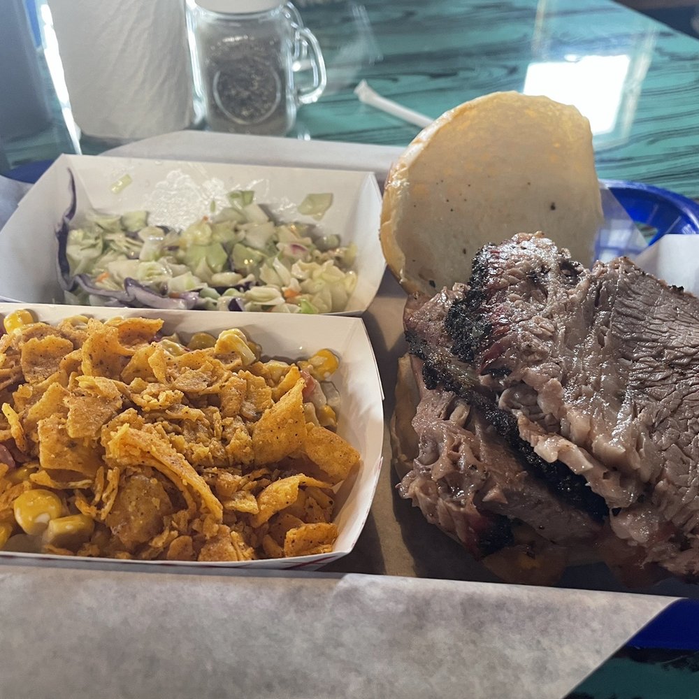 Lil' Mikes Smokin' BBQ - Big Mikes brisket & Jalapeño Cheddar sandwich with coleslaw and corn salad. - Barbeque Near Me - Rigby, Idaho Lil' Mikes Smokin' BBQ - Big Mikes brisket & Jalapeño Cheddar sandwich with coleslaw and corn salad. - Barbeque Near Me - Rigby, Idaho