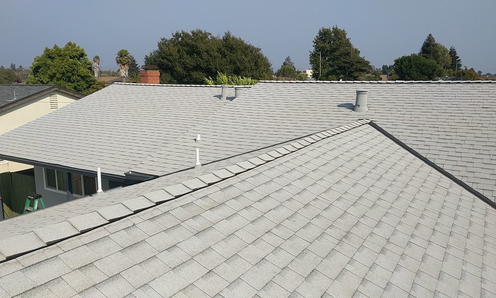 Slide of Manada Roofing