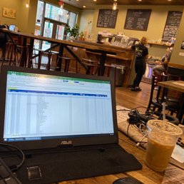 a laptop on a table a laptop on a table
