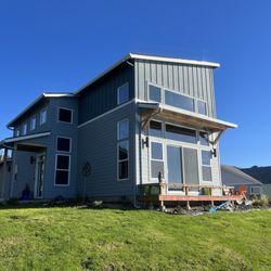 Clearview Window Films LLC. - The back side of the house that looks out on the water-we had all the windows tinted here.