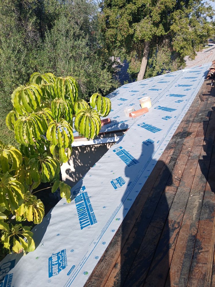 Slide of EzCalRoofing