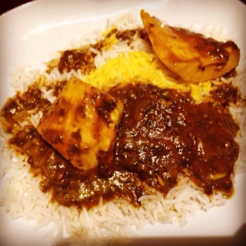 Rayhoon Persian Eatery - Ghalieh Mahi. Tilapia in a sauce of fresh herbs, garlic, tamarind and tomato. Served with saffron infused rice. - Persian/Iranian Near Me - Burlington, Ontario