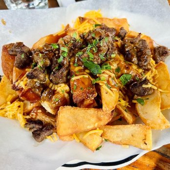 Pleasant House Pub - Deluxe Gravy Chips - British Near Me - Chicago, Illinois Pleasant House Pub - Deluxe Gravy Chips - British Near Me - Chicago, Illinois