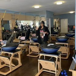 Club Pilates - Everyone's favorite! Feet in Straps!