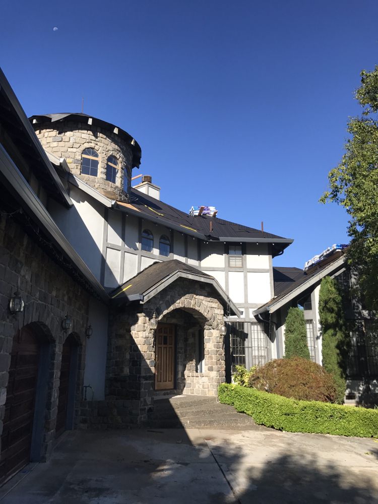 Slide of Caruzo's Roofing Contractors