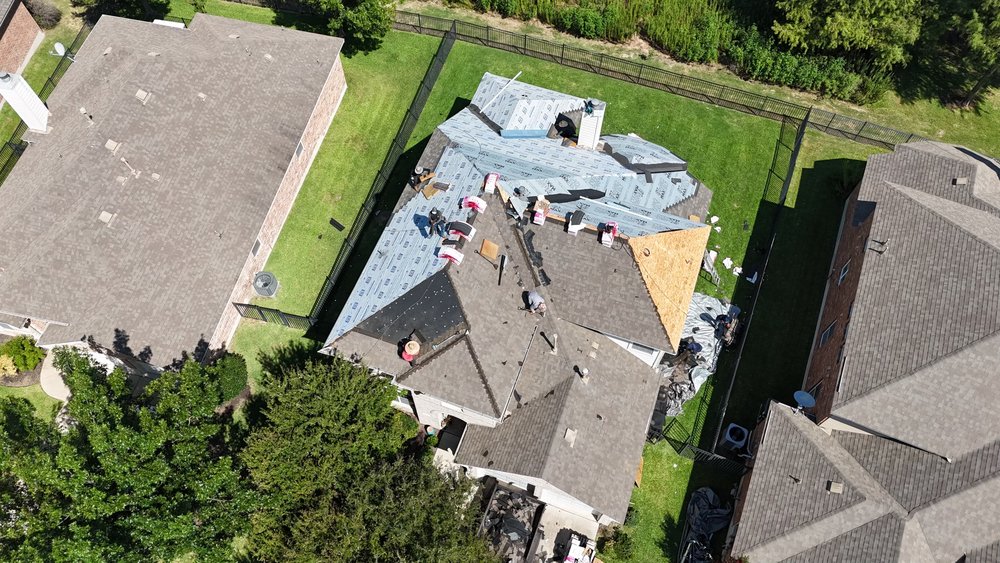 Slide of Dynamis Roofing