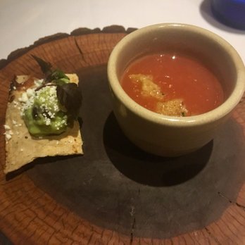 Topolobampo - Amuse Bouche: Chip with guacamole and cup of gazpacho. - Mexican Near Me - Chicago, Illinois Topolobampo - Amuse Bouche: Chip with guacamole and cup of gazpacho. - Mexican Near Me - Chicago, Illinois