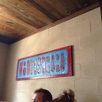 Mojo Old City BBQ - Interesting artwork interacting with old city feel and Spanish heritage. - Barbeque Near Me - St. Augustine, Florida