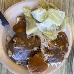 Hamburger, steak, brown gravy, onions, cabbage, rice, and gravy