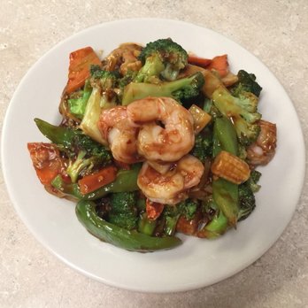 New China - shrimp and broccoli on a white plate - Chinese Near Me - Ashland, Missouri New China - shrimp and broccoli on a white plate - Chinese Near Me - Ashland, Missouri