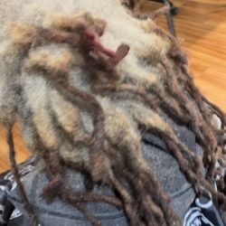 Hair by BELLA - Loc construct part, reattach loc, color, deep treatment and re-twist  

Before picture