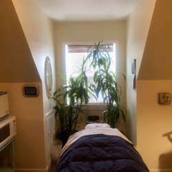 Bodega Bay Massage - Massage table with a body support system.