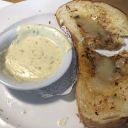 Gavin's On The Square - Cheesy Bread with sauce. (1) of four slices of gigantic bread.