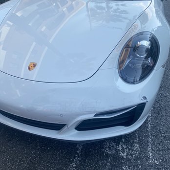 Castle Auto Body - Broken headlight, front bumper before repair at Castle Auto Body. - Body Shops Near Me - Los Angeles, California