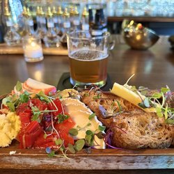 Up close charcuterie and an Angels Envy Gold Rush cocktail