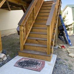 K & F Contracting - Rear deck Stairs with landing. Vinyl composite decking treads and top rail.