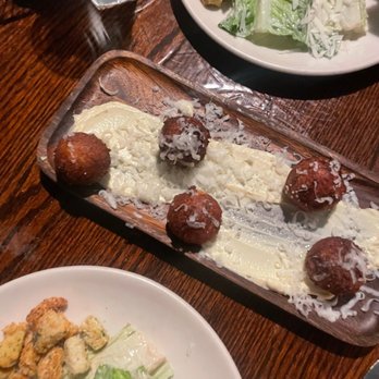 Vespaio Ristorante - Crispy Dauphine Potatoes & Caesar Salad - Italian Near Me - Austin, Texas Vespaio Ristorante - Crispy Dauphine Potatoes & Caesar Salad - Italian Near Me - Austin, Texas