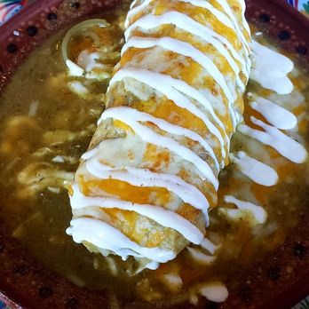 Super Antojitos - Chile Verde Burrito Wet with a scrambled egg inside. - Mexican Near Me - Orange, California Super Antojitos - Chile Verde Burrito Wet with a scrambled egg inside. - Mexican Near Me - Orange, California