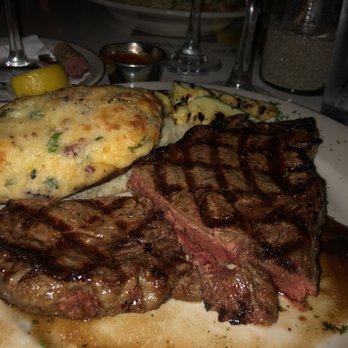 Side Door Cafe - My rib eye steak and twice baked potato - New American Near Me - Gleneden Beach, Oregon