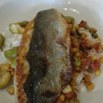 Adamo's - Seabass with white rice and fava bean succotash. - New American Near Me - Sacramento, California Adamo's - Seabass with white rice and fava bean succotash. - New American Near Me - Sacramento, California