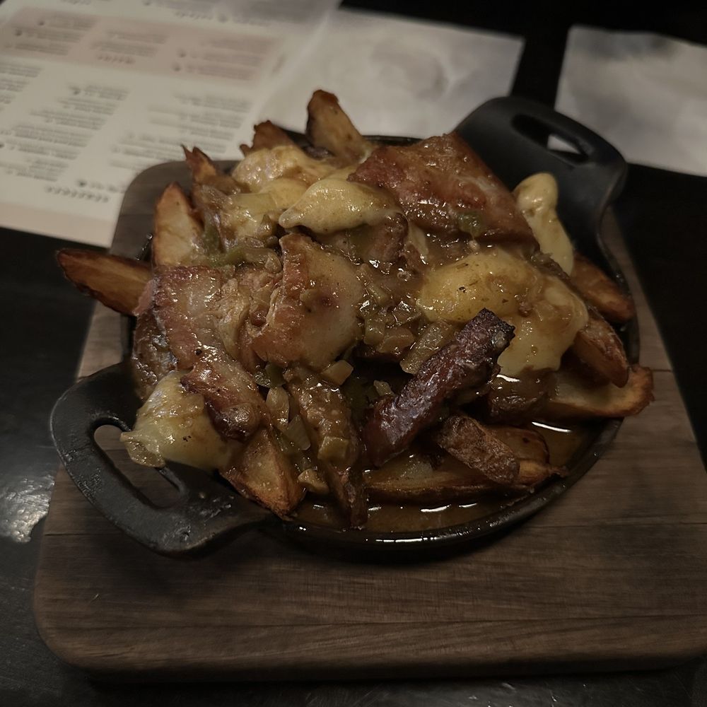 Bosscat Kitchen & Libations - Pork belly poutine ($15) - Bars Near Me - Orange, California Bosscat Kitchen & Libations - Pork belly poutine ($15) - Bars Near Me - Orange, California