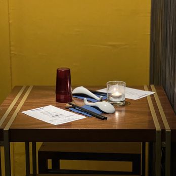 Pickerel - a wooden table with a glass of water on it - Ramen Near Me - Providence, Rhode Island Pickerel - a wooden table with a glass of water on it - Ramen Near Me - Providence, Rhode Island