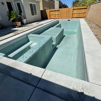 Wells Pools - Fresh Plaster! (Pebble Tech Pebble Sheen Irish Mist) - Hot Tub & Pool Near Me - Rancho Cordova, California