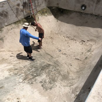 Outdoor Concepts - Packing the dirt down for concrete base. - Hot Tub & Pool Near Me - Orange City, Florida