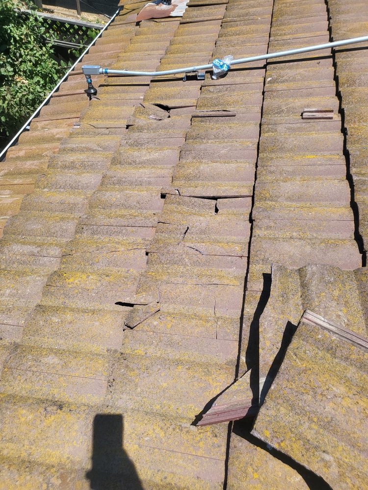 Slide of Acme Roofing Company