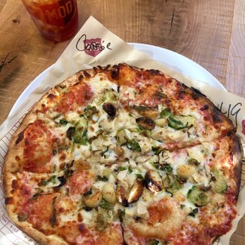 MOD Pizza - mozzarella, chicken, roasted brussels sprouts, garlic, rosemary, a sprinkle of parmesan & pesto drizzle. (plus caramelized pear iced tea!) - Fast Food Near Me - Oro Valley, Arizona MOD Pizza - mozzarella, chicken, roasted brussels sprouts, garlic, rosemary, a sprinkle of parmesan & pesto drizzle. (plus caramelized pear iced tea!) - Fast Food Near Me - Oro Valley, Arizona