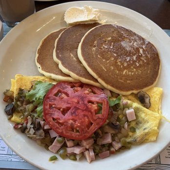 Pancake Pantry - Western Omelette with pancakes and grits. - Pancakes Near Me - Gatlinburg, Tennessee