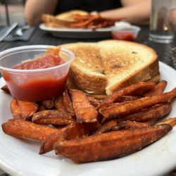 50/50 Taphouse - Now this is a meal! Bacon Jam and Brie Grilled Cheese with Sweet Potato Fries.